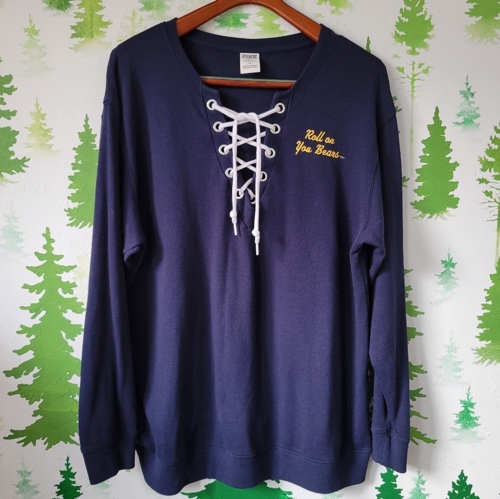 Pink Victoria's Secret Sweater.